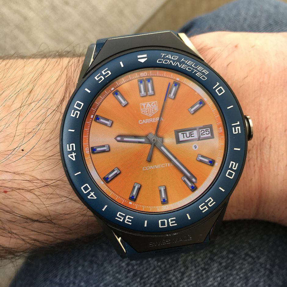 For lounging poolside at the hotel: a bright orange three-handed dial